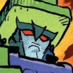 a cropped photo of the constructicon "mixmaster" from transformers skybound.